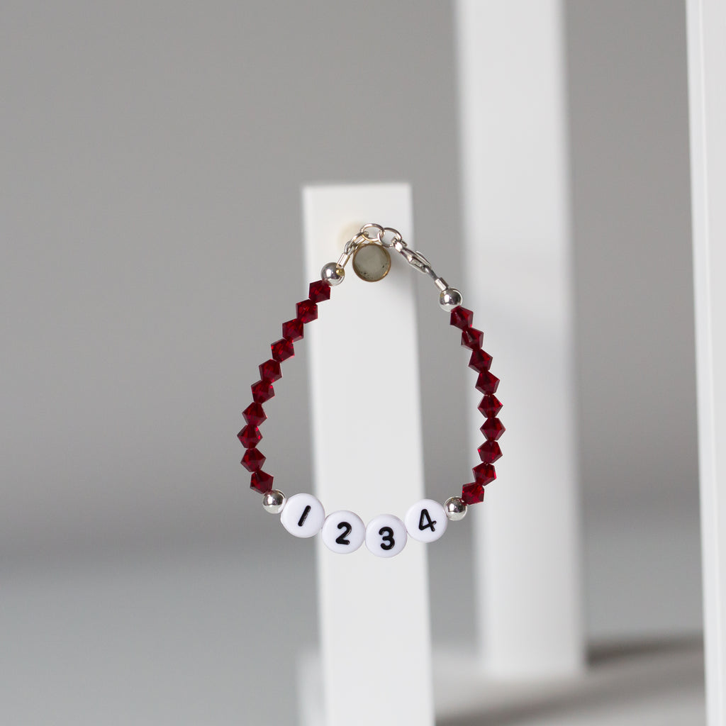 Red Badge Number Bracelet