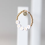 Gold letters on white beads WITHOUT metallics between