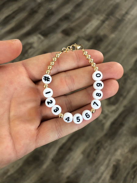 Phone number bracelet - Black numbers on white beads – Poppy Lane