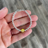 The Metallic Smiley Face Bracelet