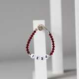Red Badge Number Bracelet