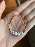 Pearl pastel letters on white beads WITHOUT metallics between