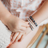White letters on black beads WITH metallics between