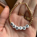 Black letters on white beads WITHOUT metallics between
