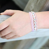 Black letters on white beads WITH metallics between