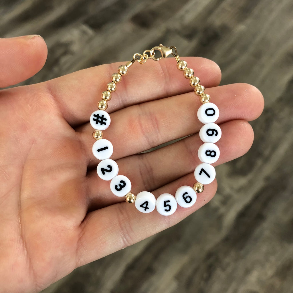 Phone number bracelet - Black numbers on white beads