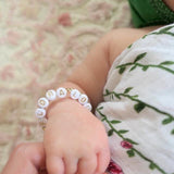 Gold letters on white beads WITHOUT metallics between