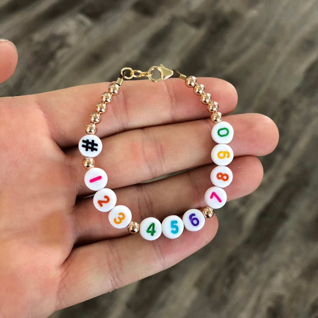 Phone number bracelet - Pastel numbers on white beads