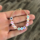 Phone number bracelet - Pastel numbers on white beads