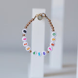 Phone number bracelet - Pastel numbers on white beads